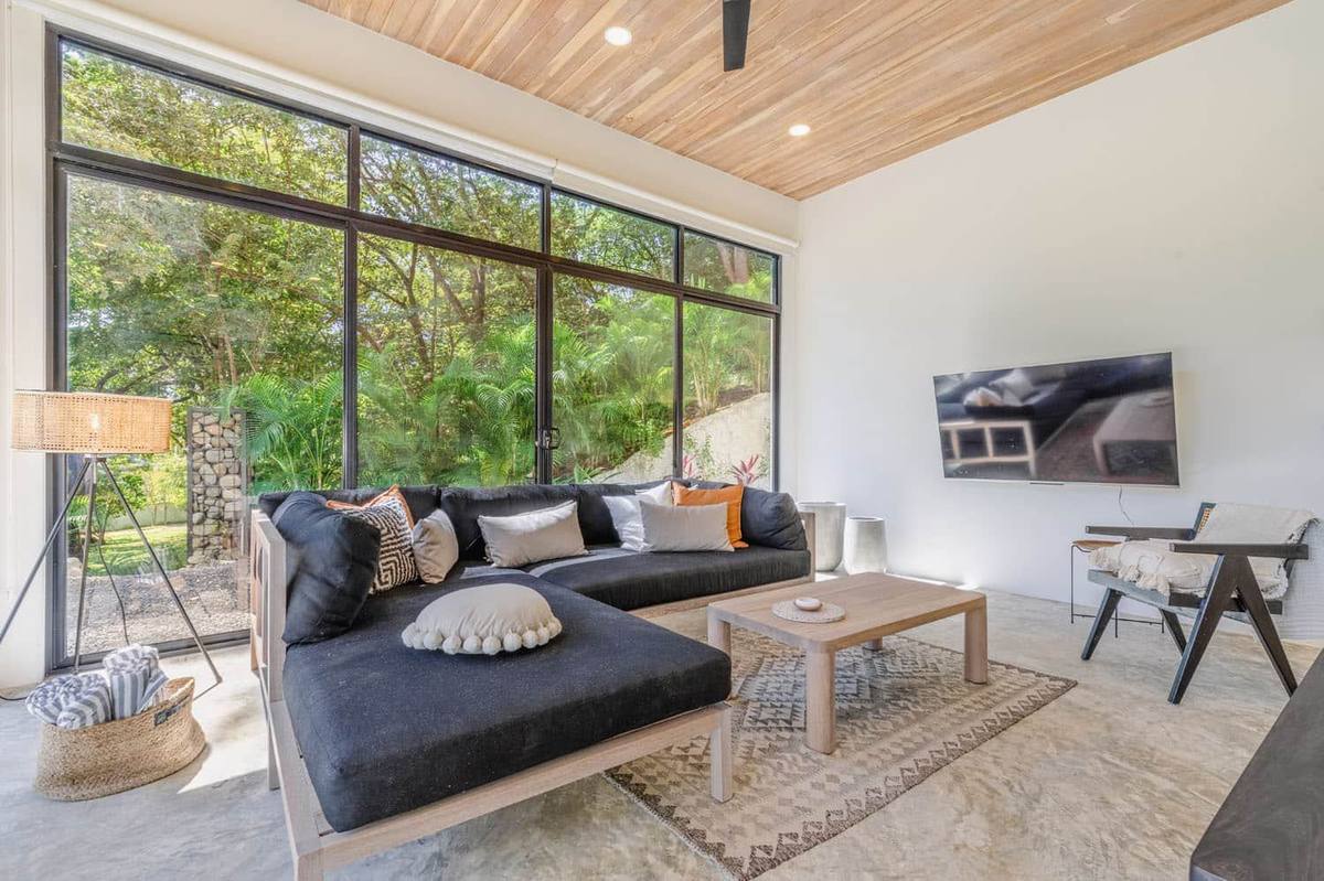Villa One - open-plan living room with jungle views