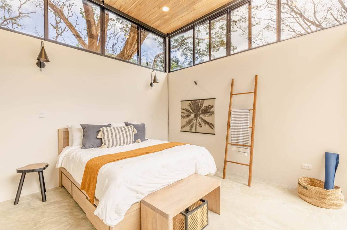 Villa One - bedroom with wood ceiling