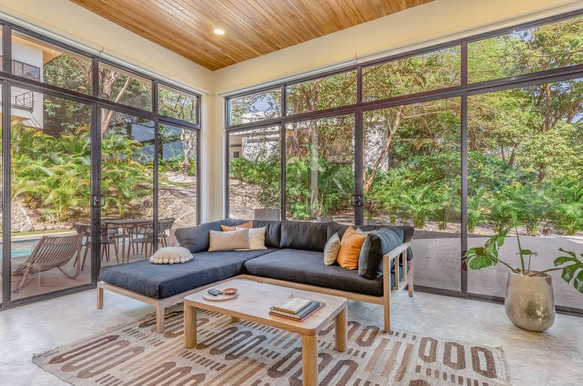 Villa Two - living room with floor-to-ceiling windows